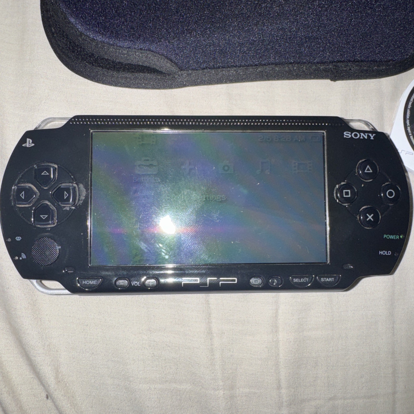 Sony PSP-1001 Handheld Game System Black with Case and charger