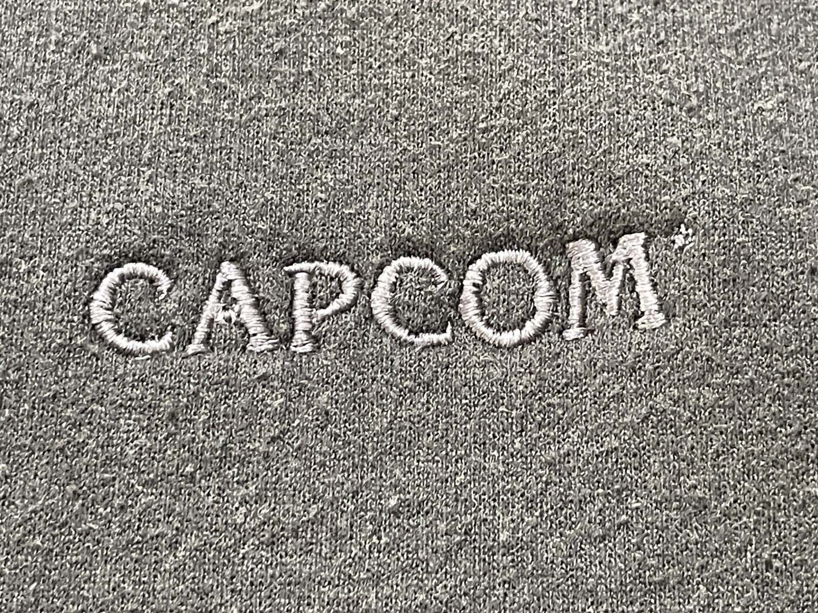 VINTAGE CAPCOM PROMO HOODIE LARGE ZIP UP BLACK w BLACK LOGO circa 1998/2000