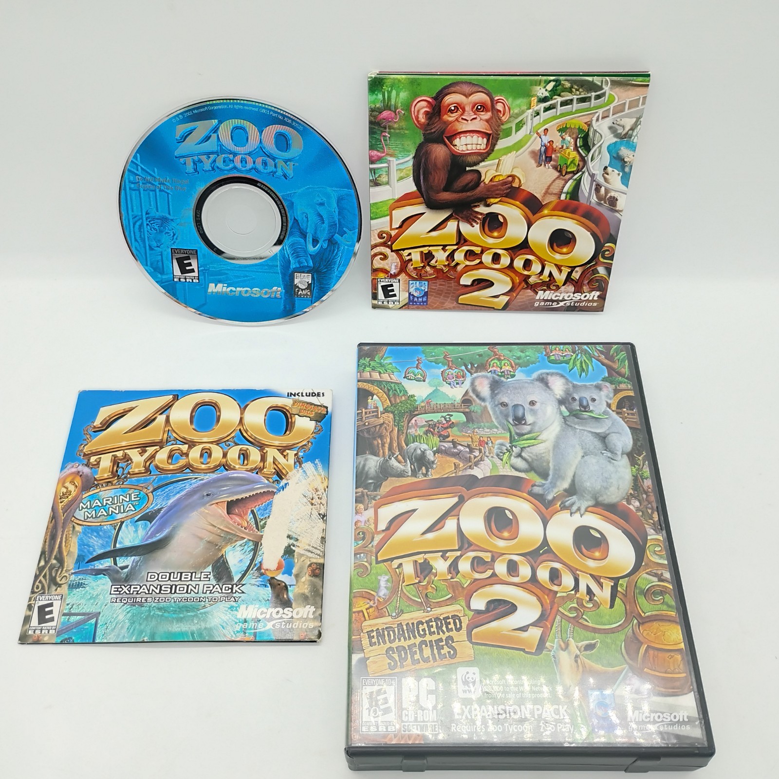 Zoo Tycoon: 1 & 2 w/ Marine Mania & Dinosaur Digs, And Endangered Species (PC)