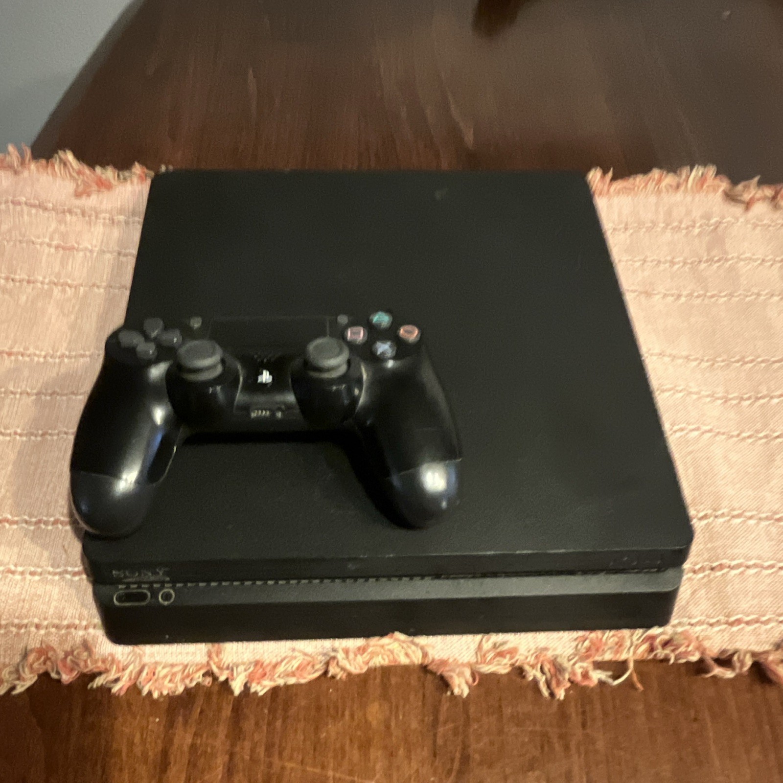 Sony PlayStation 4 Slim Console + DualShock 4 Controller, 4 Games and cables