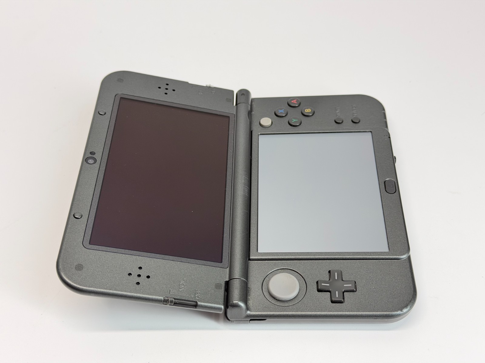 Nintendo New 3DS XL Metallic Black Handheld System *Screen has Yellow Line*