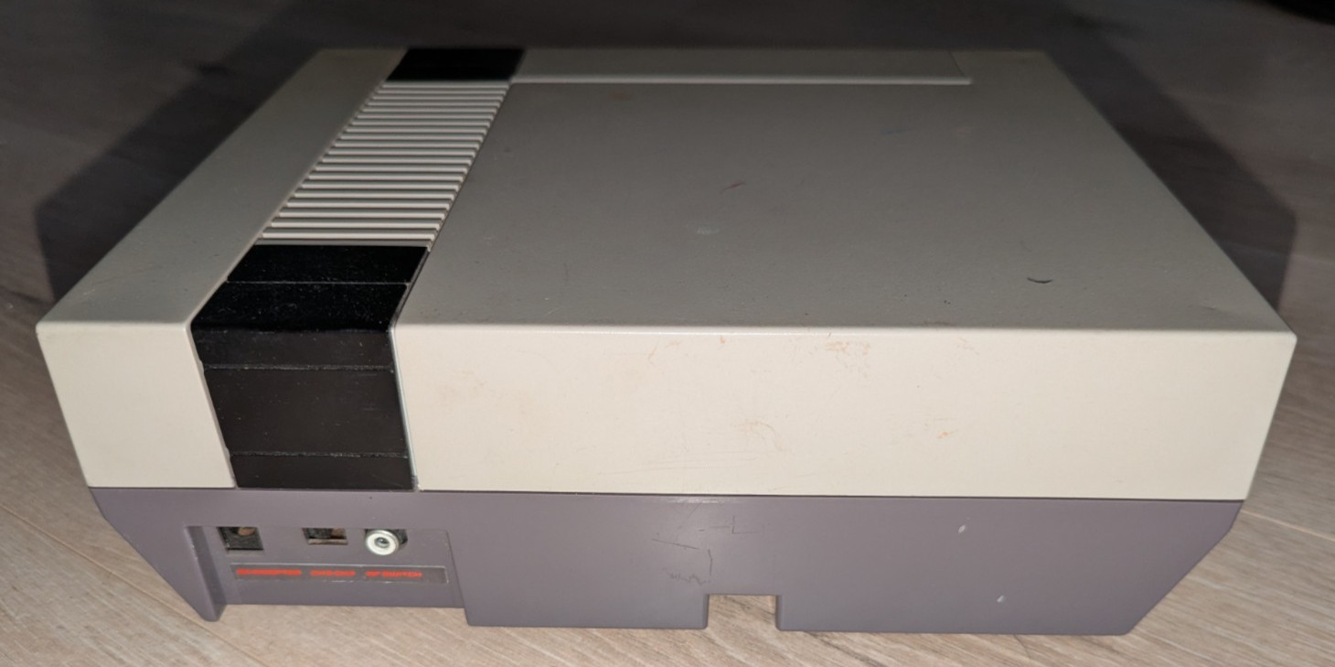 Original Nintendo NES Entertainment System w/ Super Mario Bros 1-3 & Game Genie