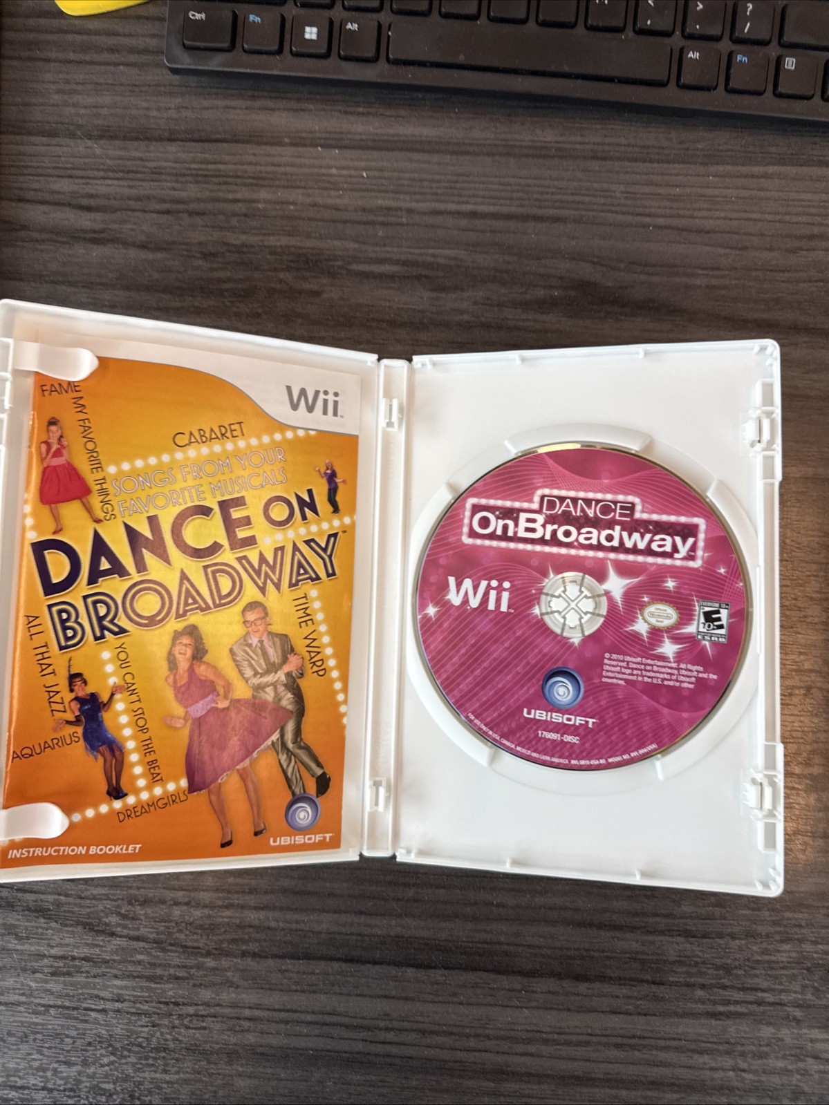 3 Popular Wii games In their Cases With Pamphlets.