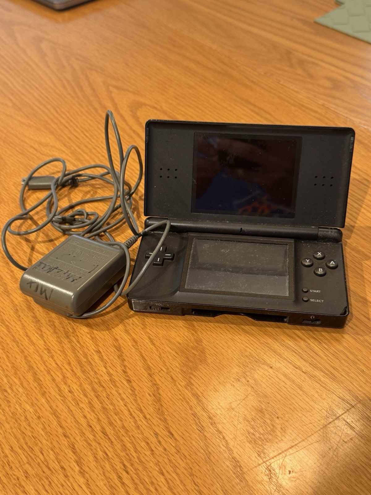 Black DS Lite Tested Working with Charger. Stylus Not Included.