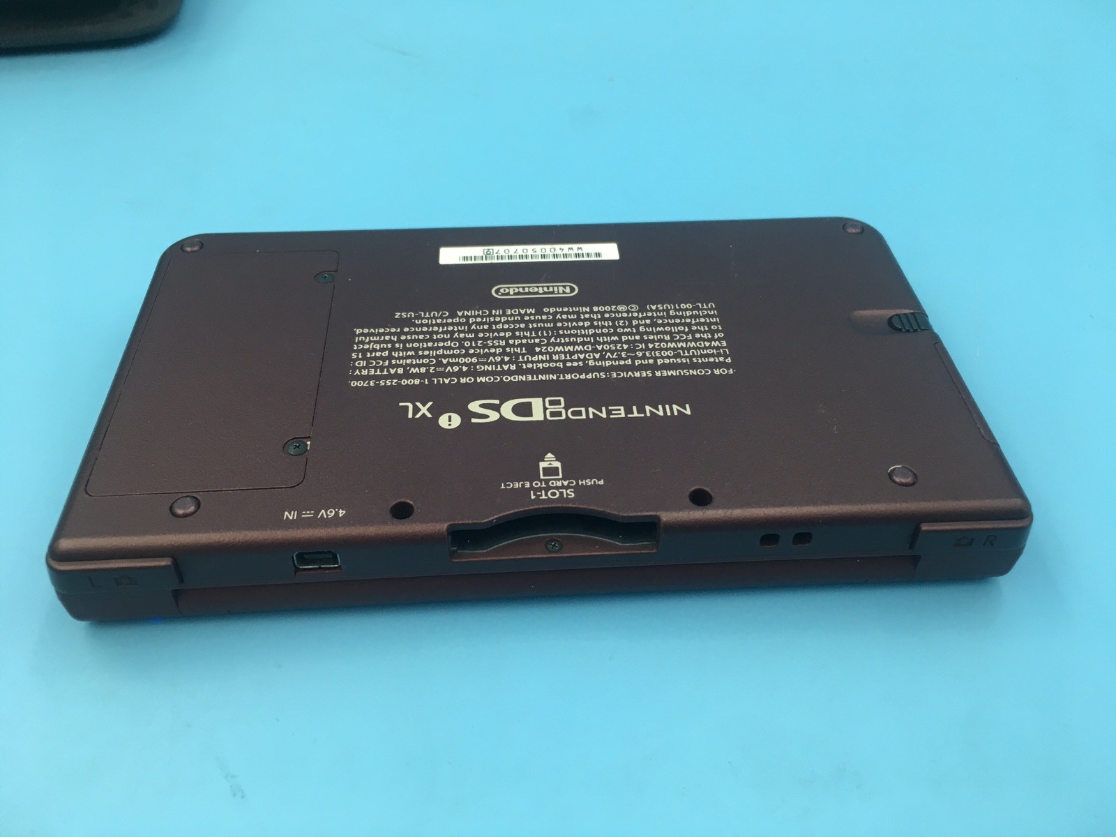 Nintendo DSi XL Red Burgundy UTL-001 w/ Stylus, Charger, 1gb SD Card, & Case
