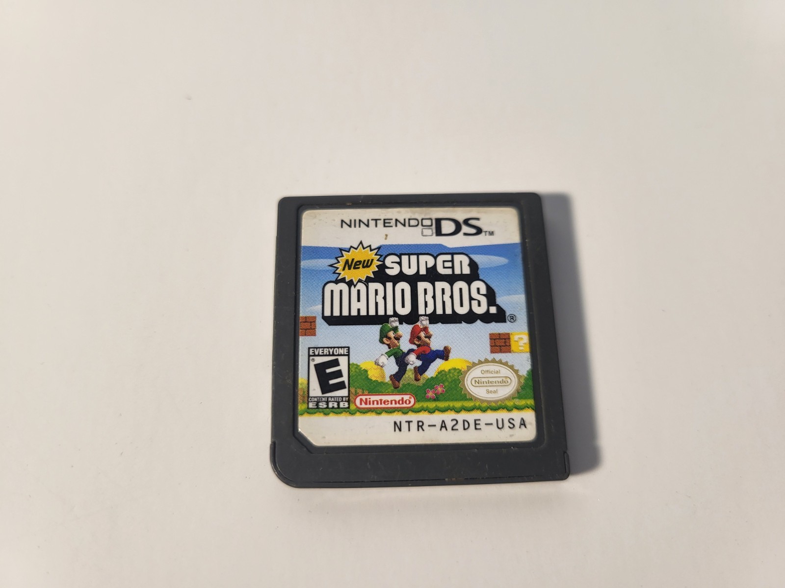 Nintendo DS Lite Handheld with Charger and Mario Bros USG-001 FULLY WORKING