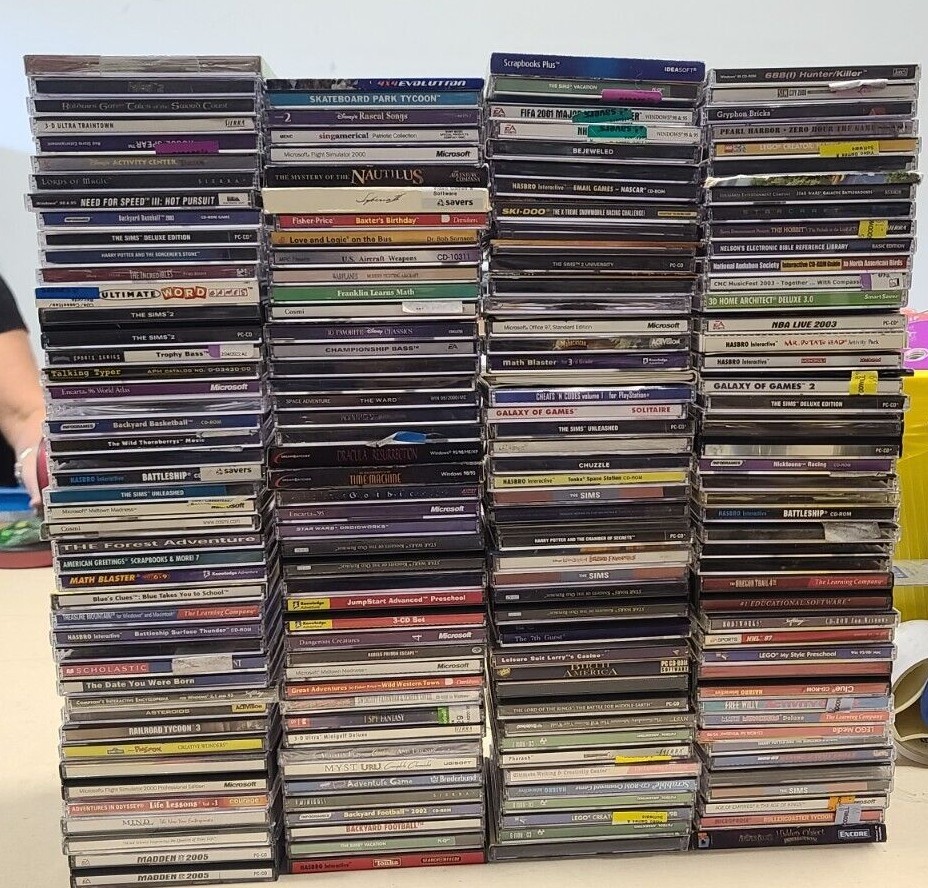 Huge PC Games and Softwares Lot about 80 Discs Free Shipping Random Assorted