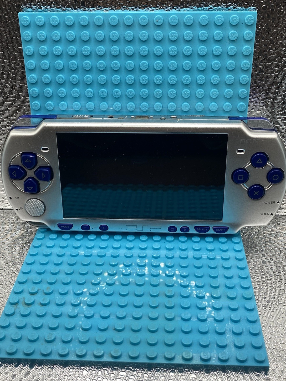 PlayStation PSP-2006 Silver No Battery Turns On Does Not Read Disk For Parts