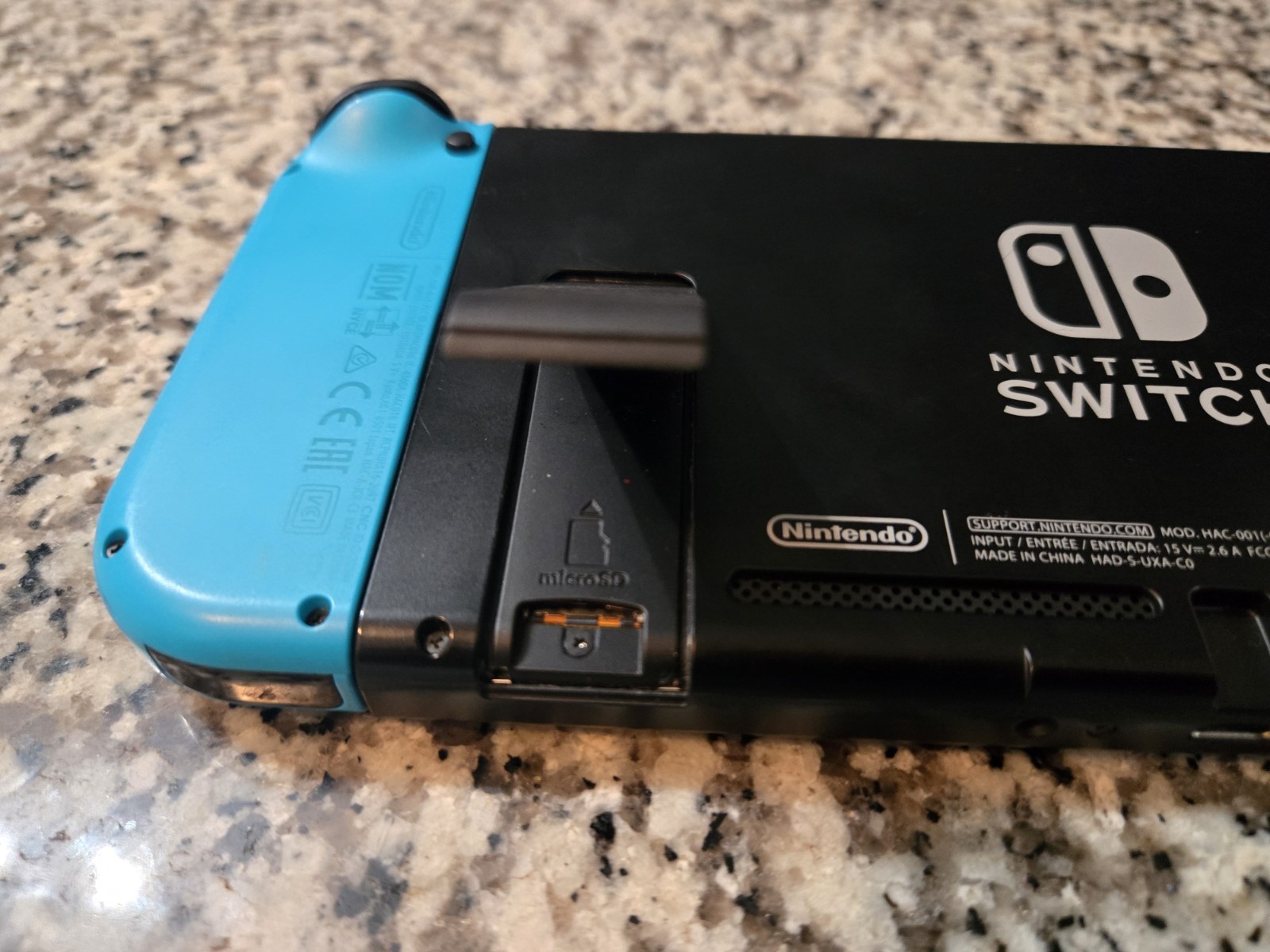 Nintendo Switch Console Handheld System w/ Neon Red & Blue Joy-Con, CLEAN