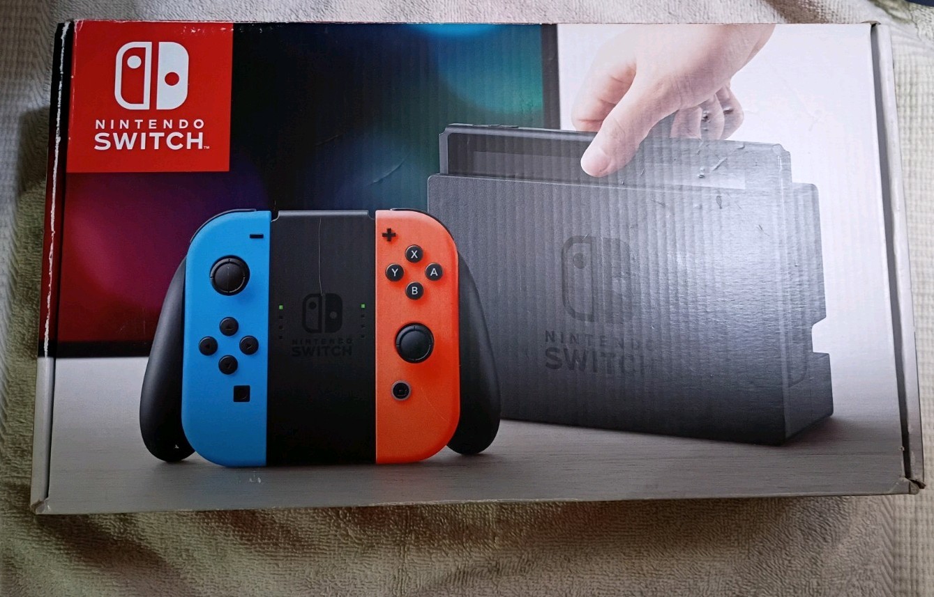Nintendo Switch with Neon Blue and Neon Red Joy-Con