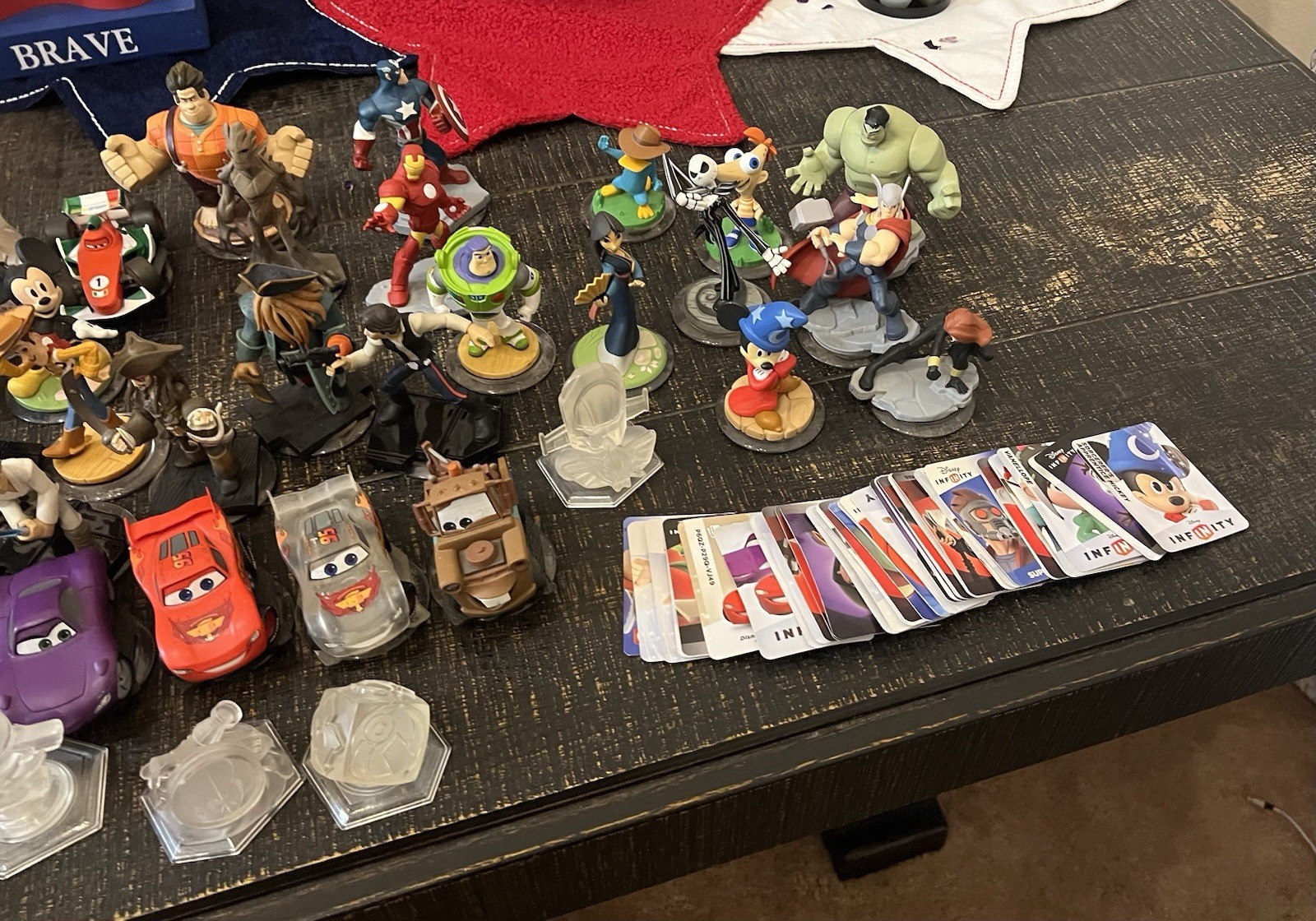 Assortment of Disney Infinity Figures With Power Disks And Play Cards (Not All)
