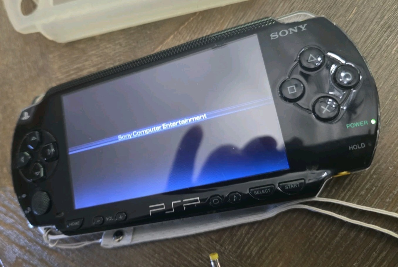 Sony PSP-1001 Black Handheld System, Charger, Memory Cards, And Cases. Read !!