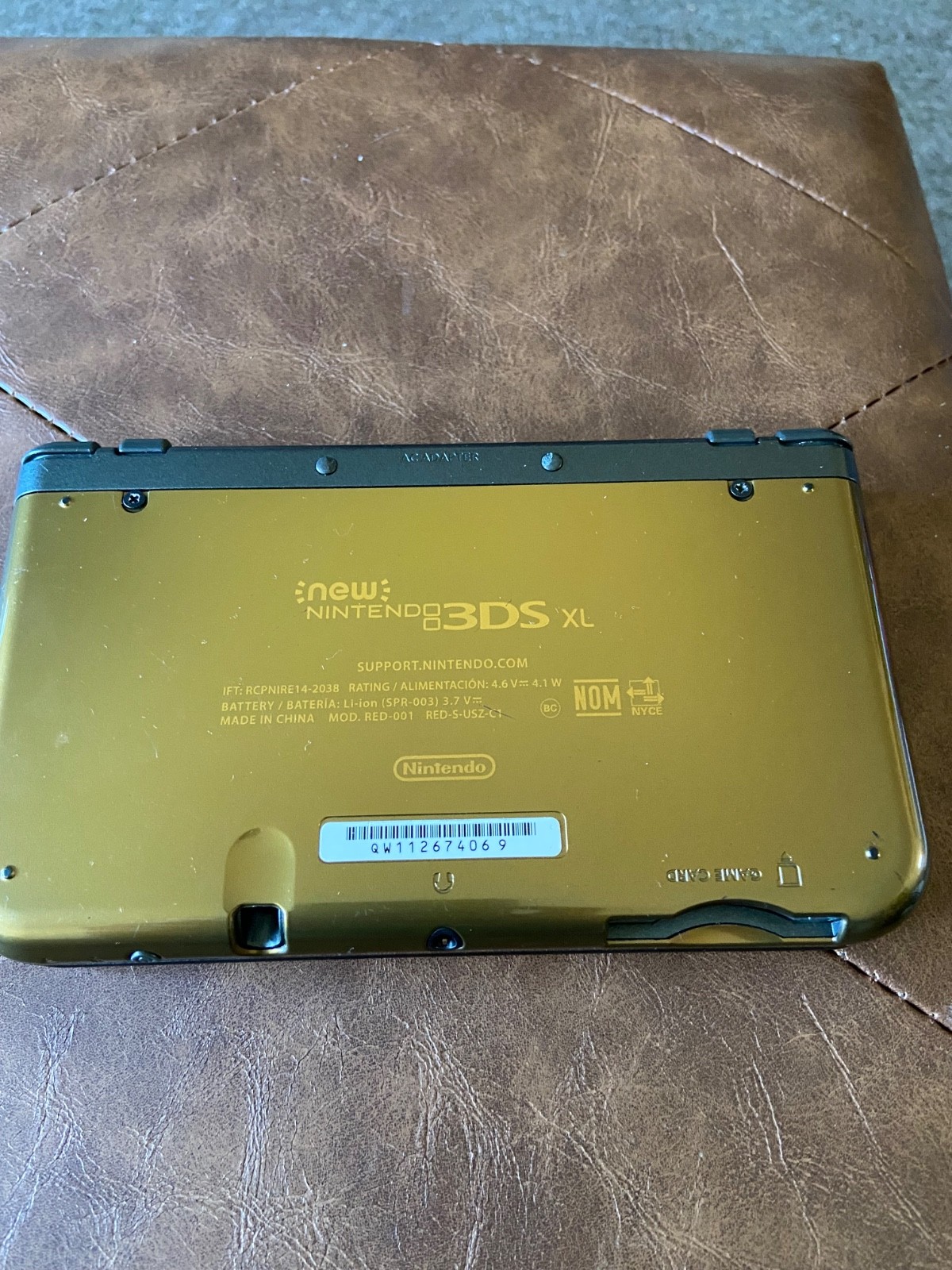 Nintendo New 3DS XL Launch Edition Gold Handheld System