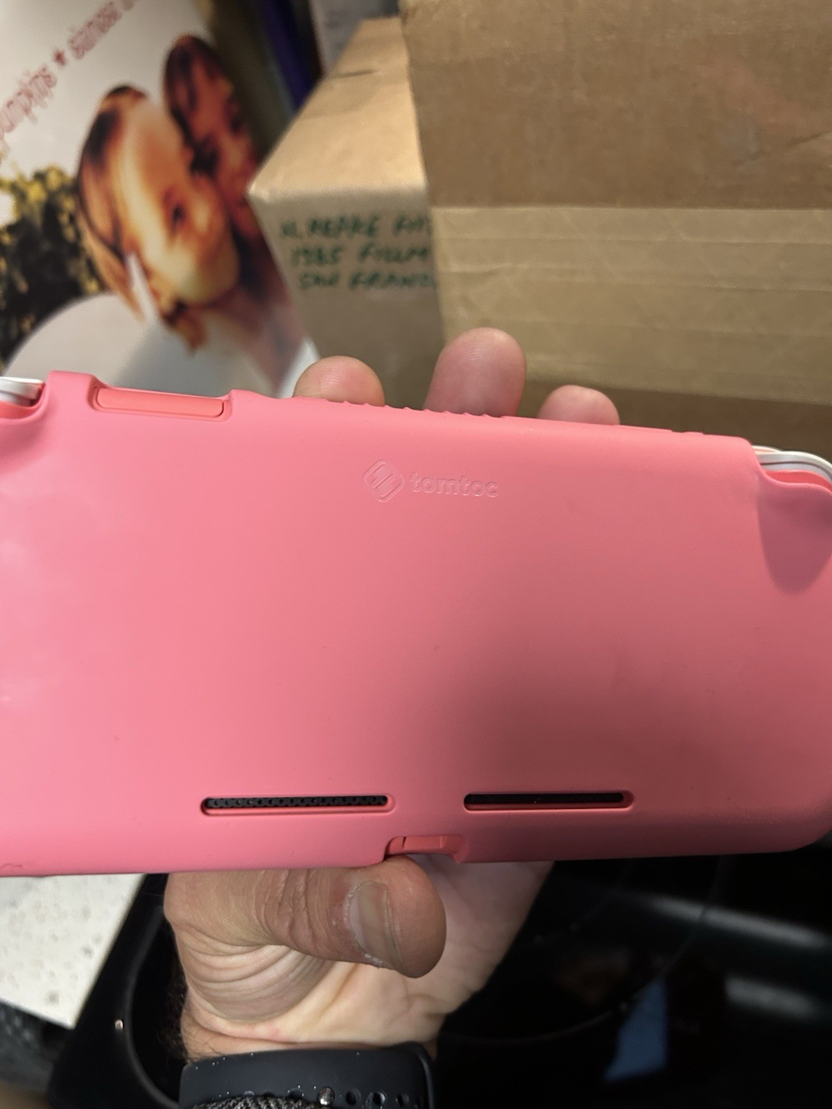 Nintendo Switch Lite – Pink – With tomtoc Sleeve Case, OEM Charging Brick, Luigi