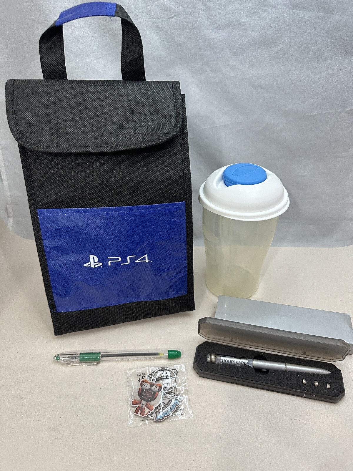 Sony Playstation Promo Lot- Light Up Pen w/Case Blue Light, PS4 Lunch Bag, More!