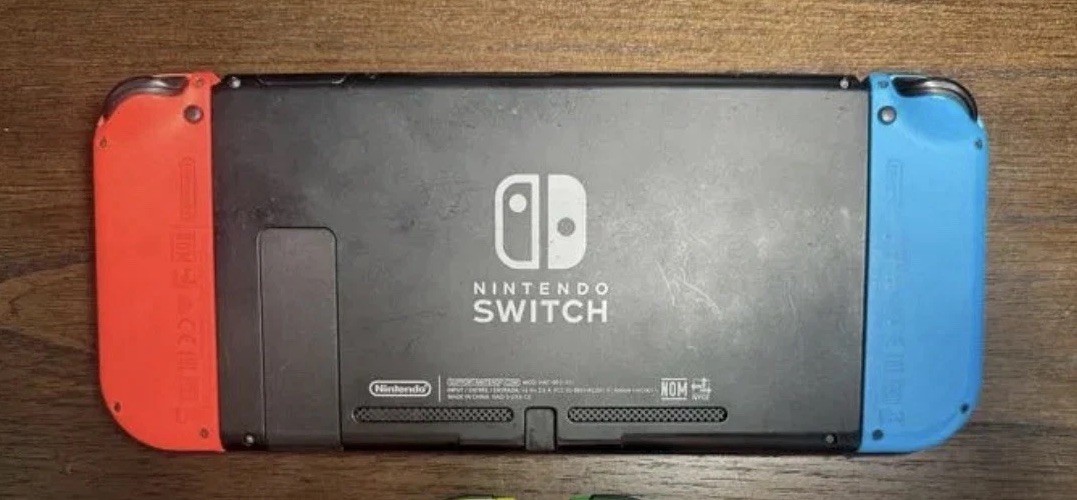 Nintendo Switch Console, Charging Cable, Docking Station, JoyCon Attachment