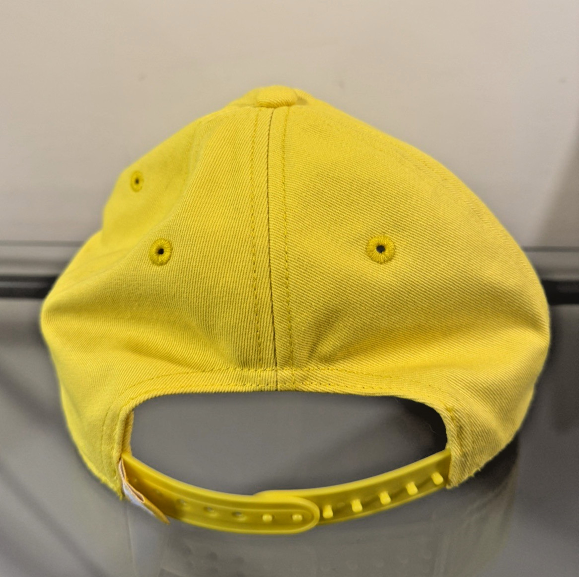 Nintendo New York WARIO W Logo Adjustable Snapback Yellow Nintendo