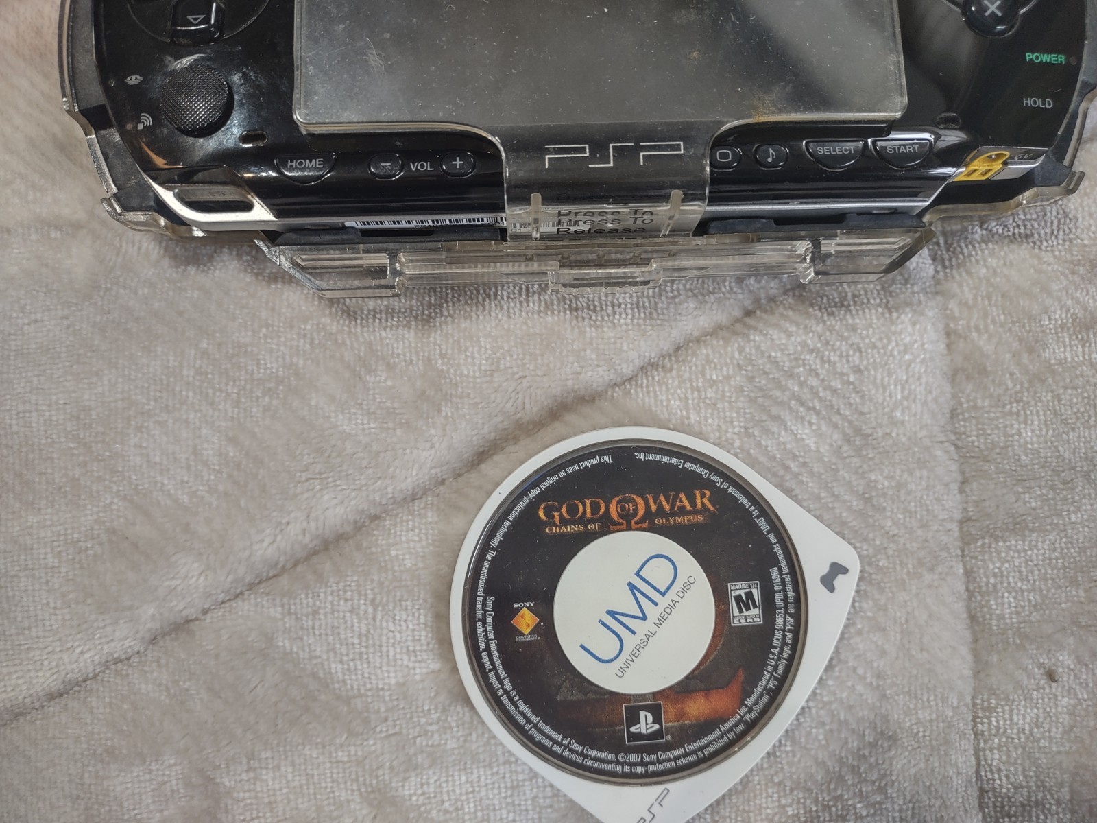 Sony PlayStation PSP-1001 w/Clear Travel Case, Charger, Memory, 8 games 1 movie