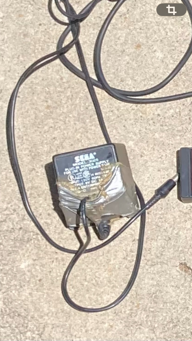 2 sega master system consoles with 3 controllers and games (not sure if it works