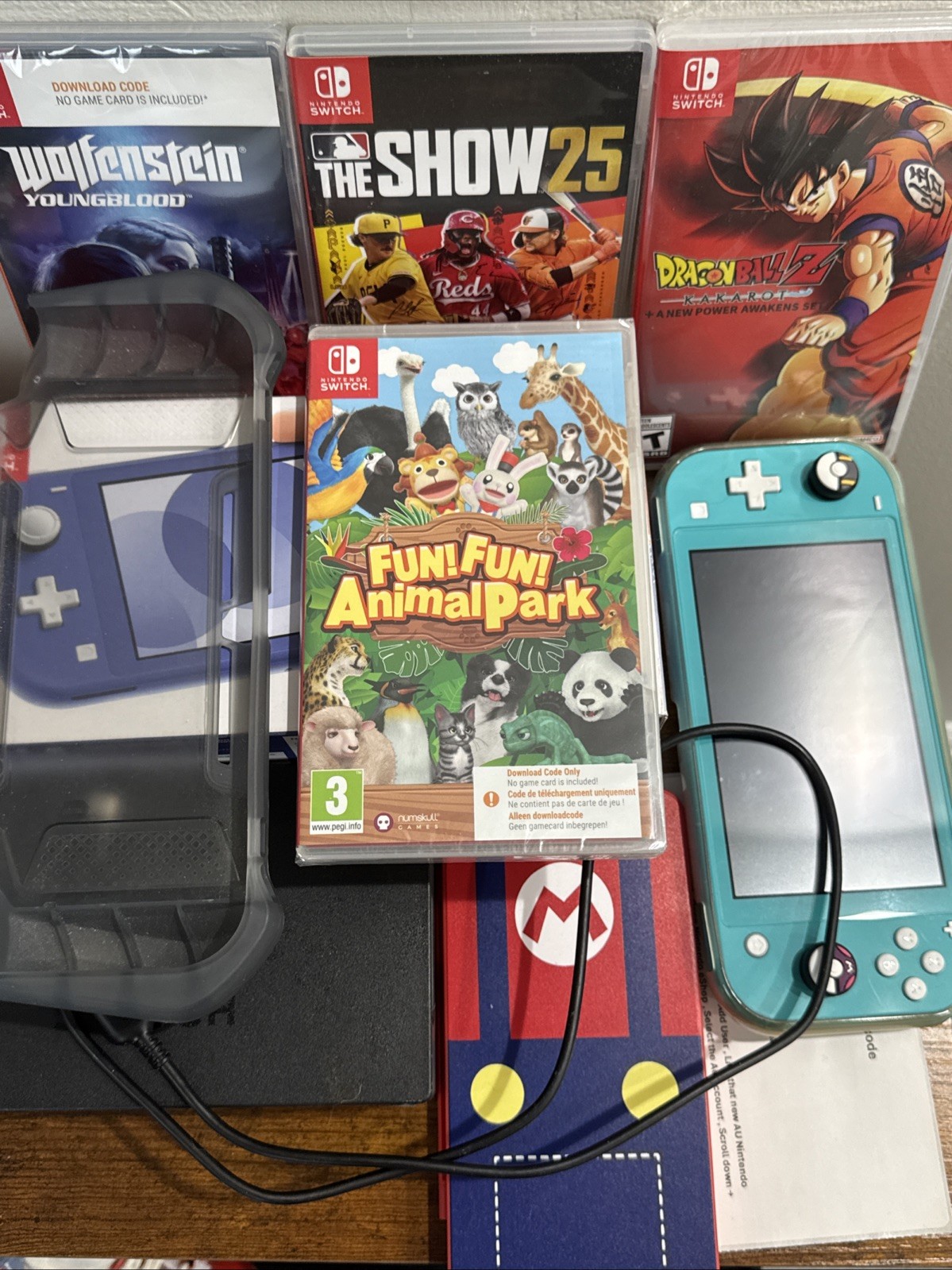 Nintendo Switch Lite 32GB Handheld Console TurqoiseBundle 4 Games + Charger+ Box