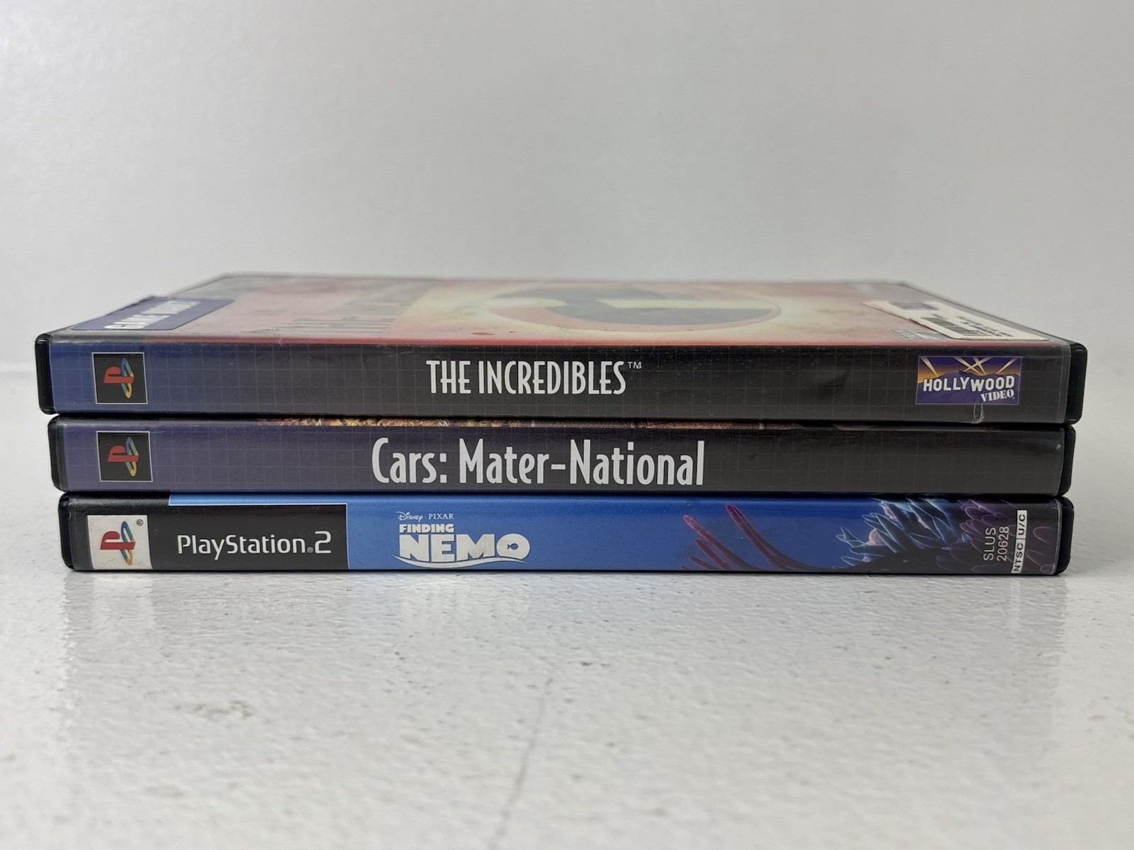Disney PlayStation 2 Game Lot Finding Nemo, Cars Mater National, The Incredibles