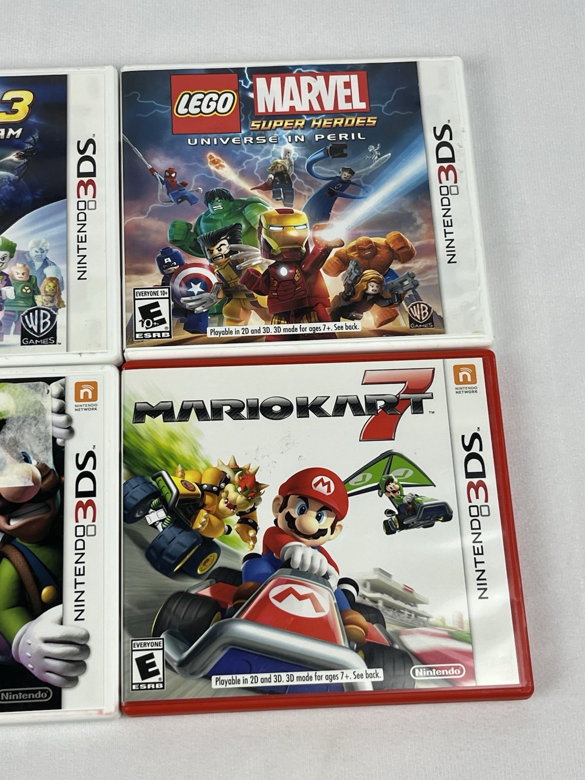 Nintendo 3DS XL Red Bundle w/ Charger, Stylus, SD Card, and 15 DS/3DS Games