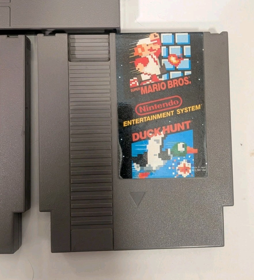 Nintendo NES Game Lot (Bundle of 3): Mario/Duck Hunt, Jaws, Spy Hunter – Used