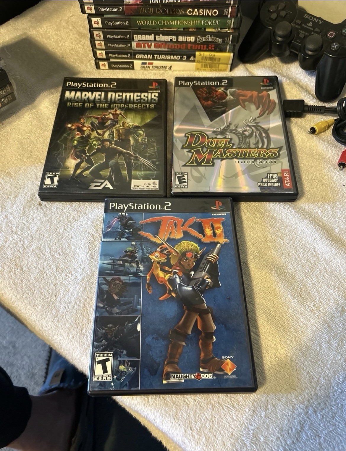 PlayStation 1, 2, & 3 Game lot. 19 total games & PS2 wired controller. Used