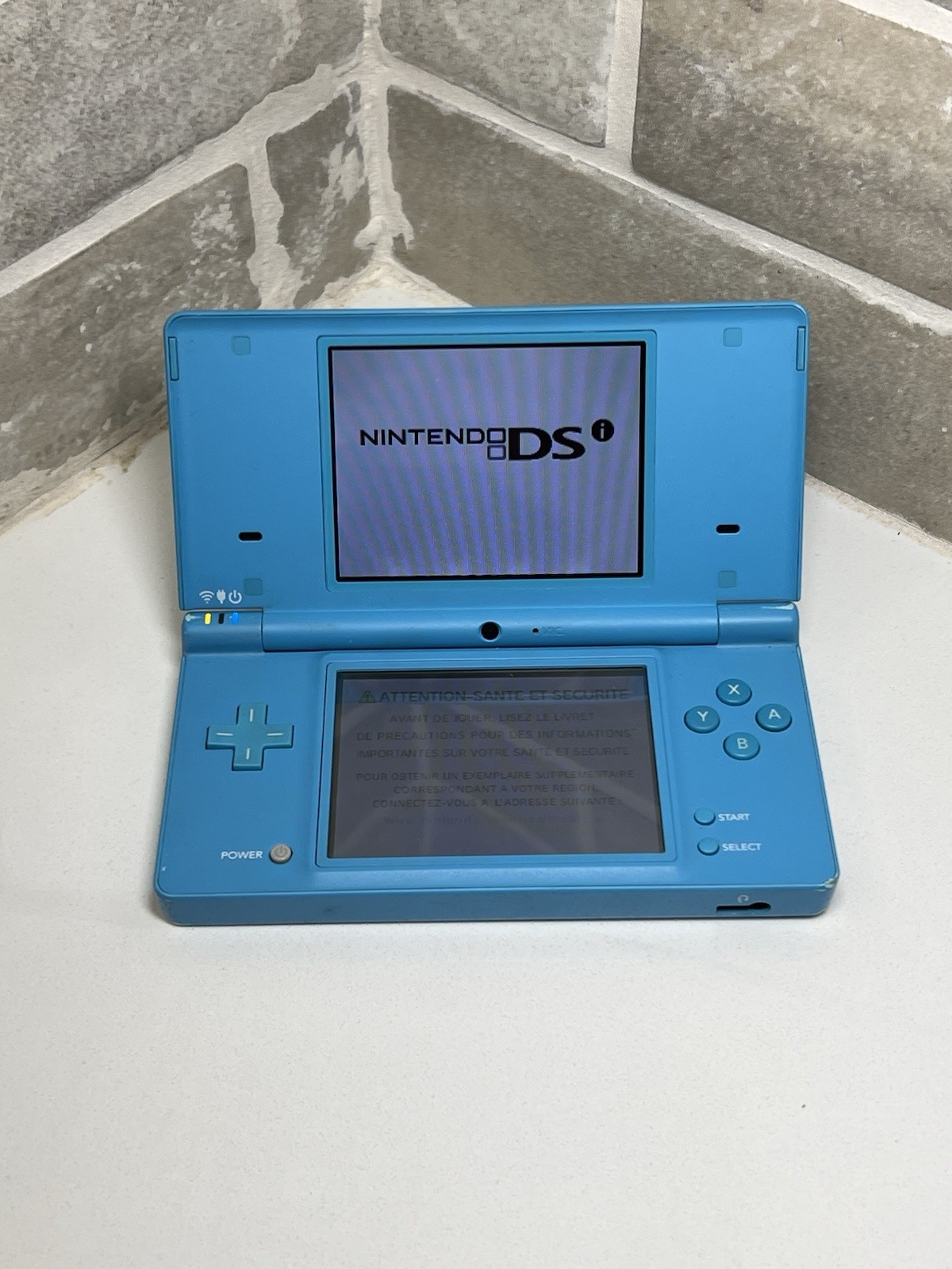 Nintendo DSi Light Blue Handheld Console Game System + Charger + Stylus Tested