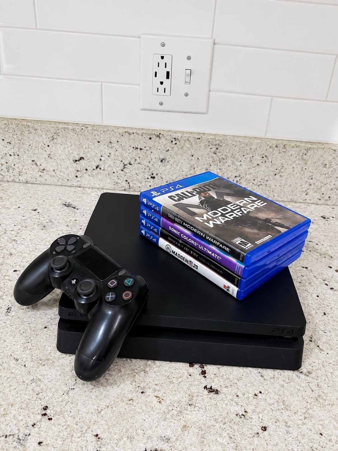 Sony PS4 Slim 4K Black Console w/ DualShock 4 + 4 Games Bundle