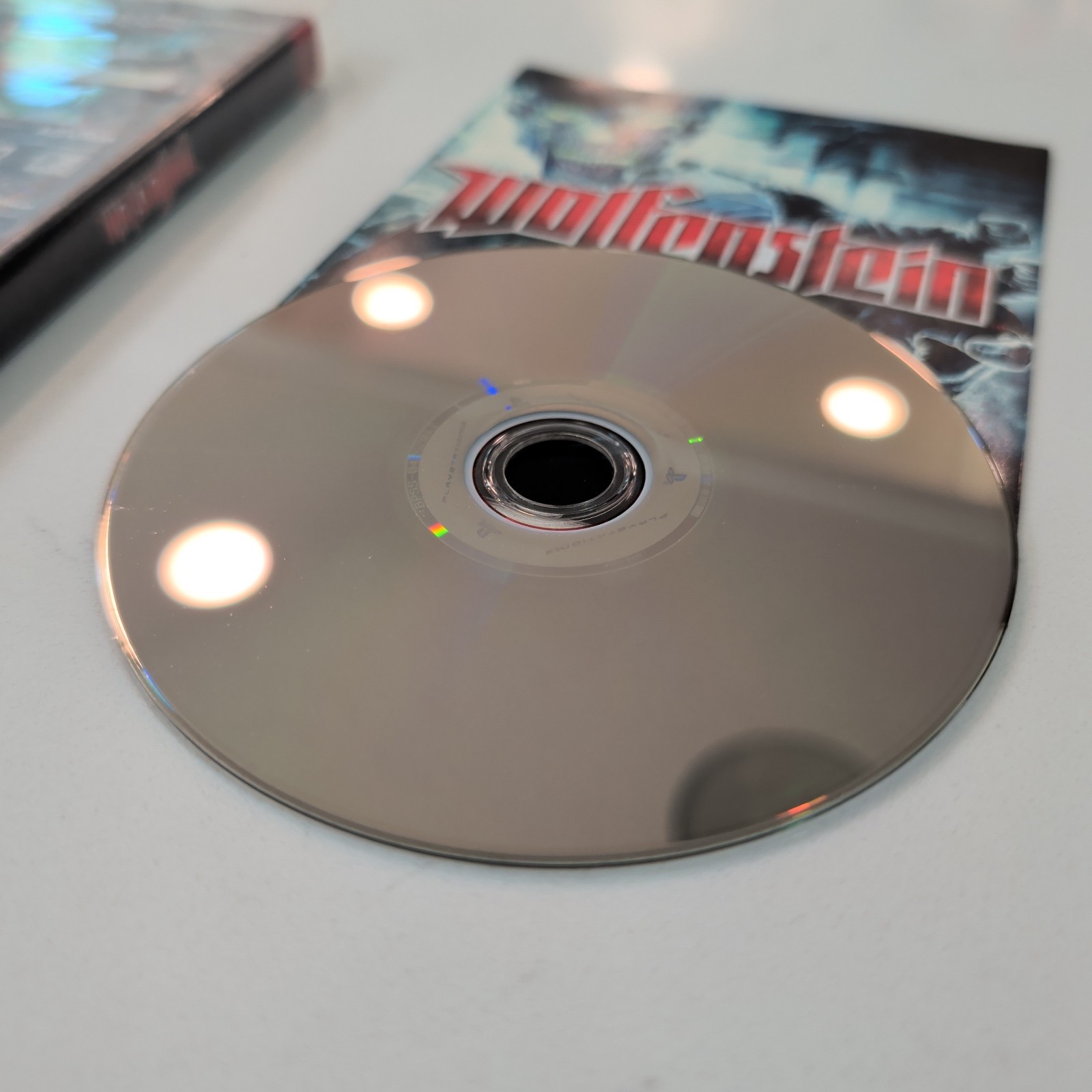 Wolfenstein (Sony PlayStation 3, 2009) w/ Manual – Wavy Artwork – Tested