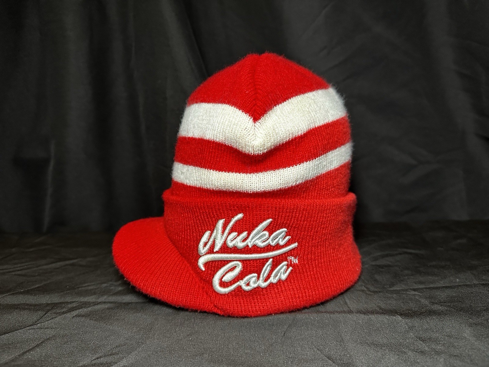 Lot of Bethesda Fallout Nuka Cola Bottle Caps, Beanie Hat, Lanyard & Keychain