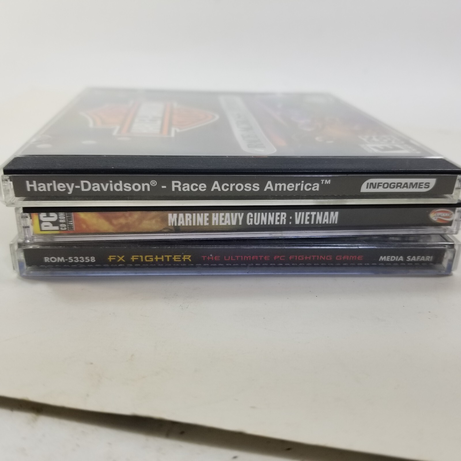 Lot of 3x Games Harley Race Across America, Marine Heavy Gunner, FX Fighter (PC)