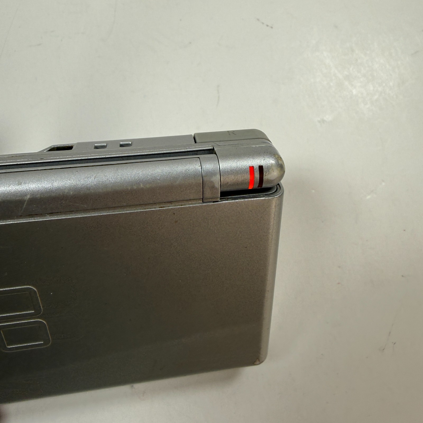 Nintendo DS Lite USG-001 Silver Handheld Console 4 Games + Charger
