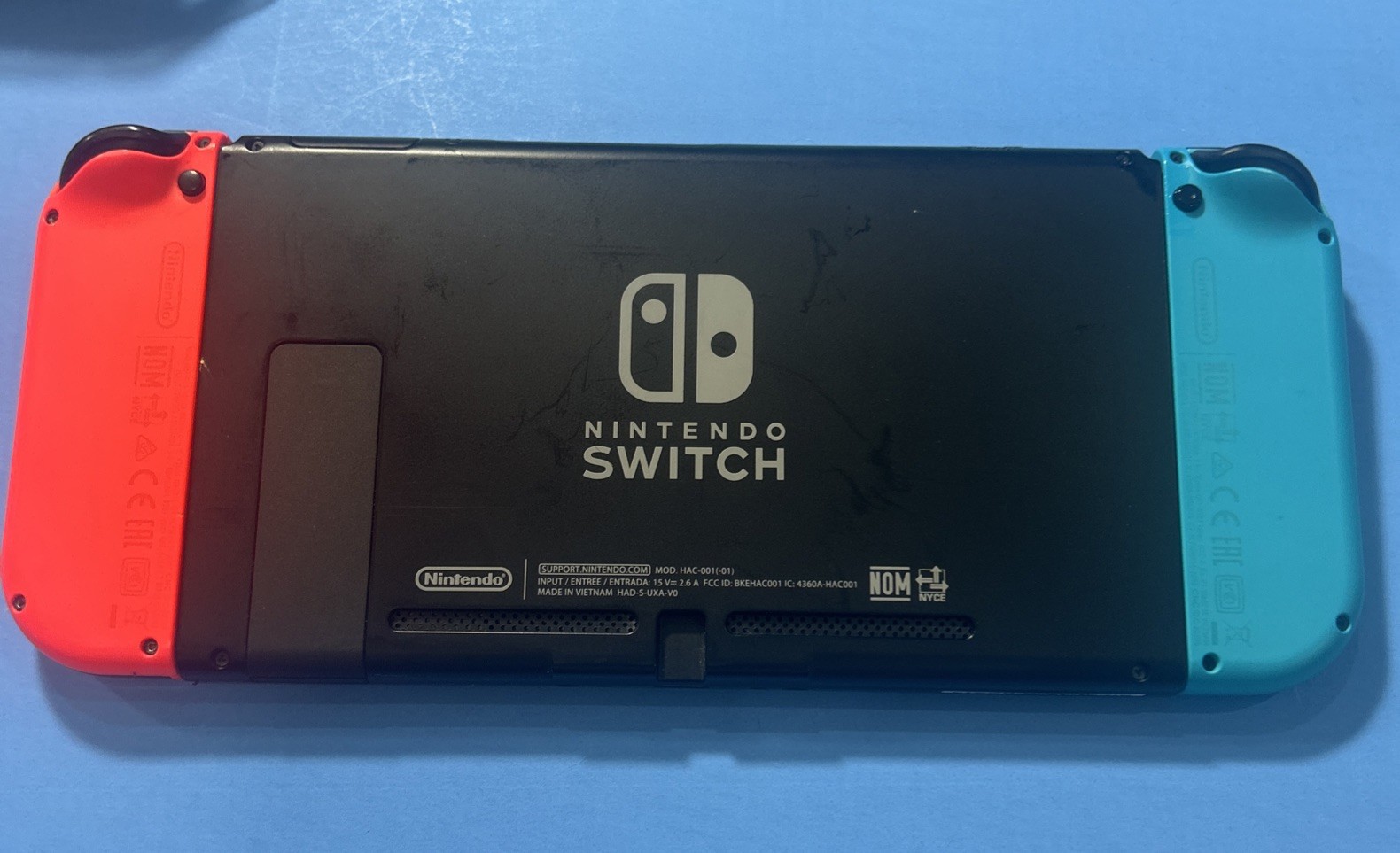 Nintendo Switch with Neon Blue and Neon Red Joy Con Bundle Complete With Games