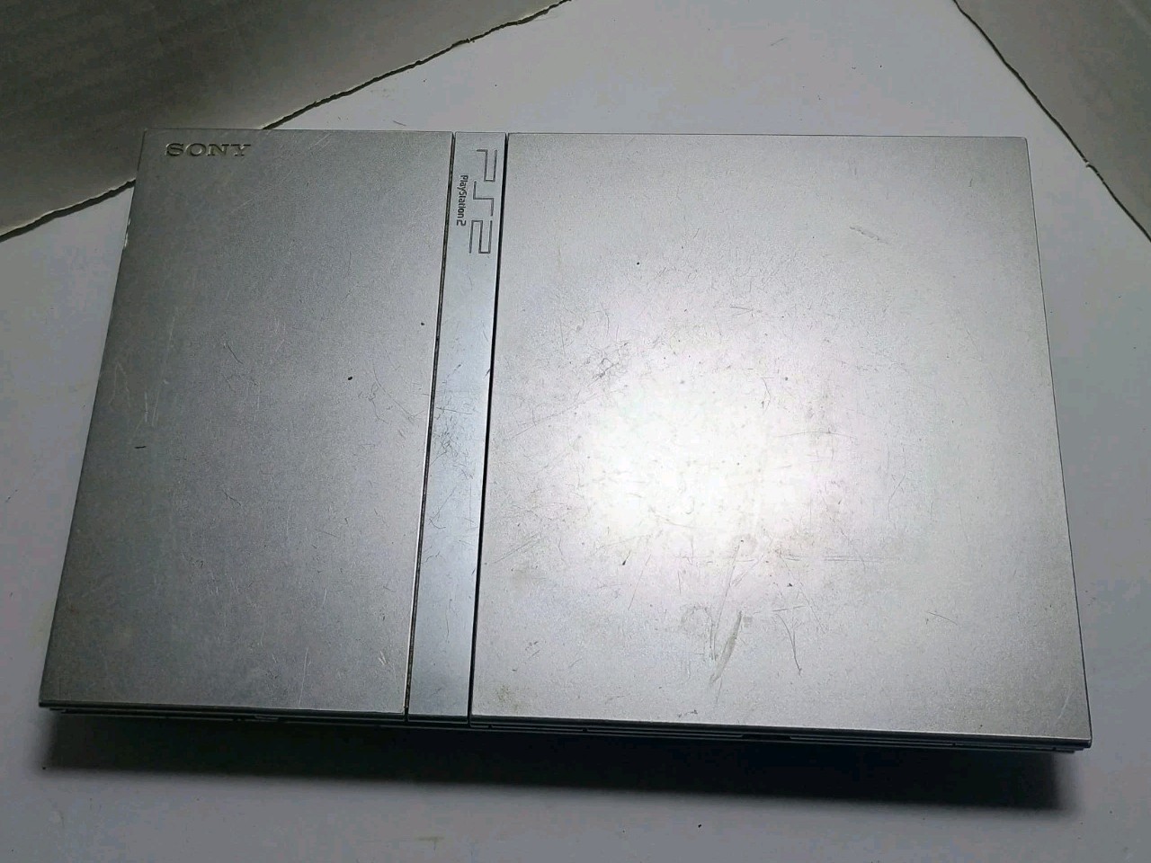 PS2 Silver Slim Console Only *AS IS* FOR PARTS REPAIR *No AV Signal*