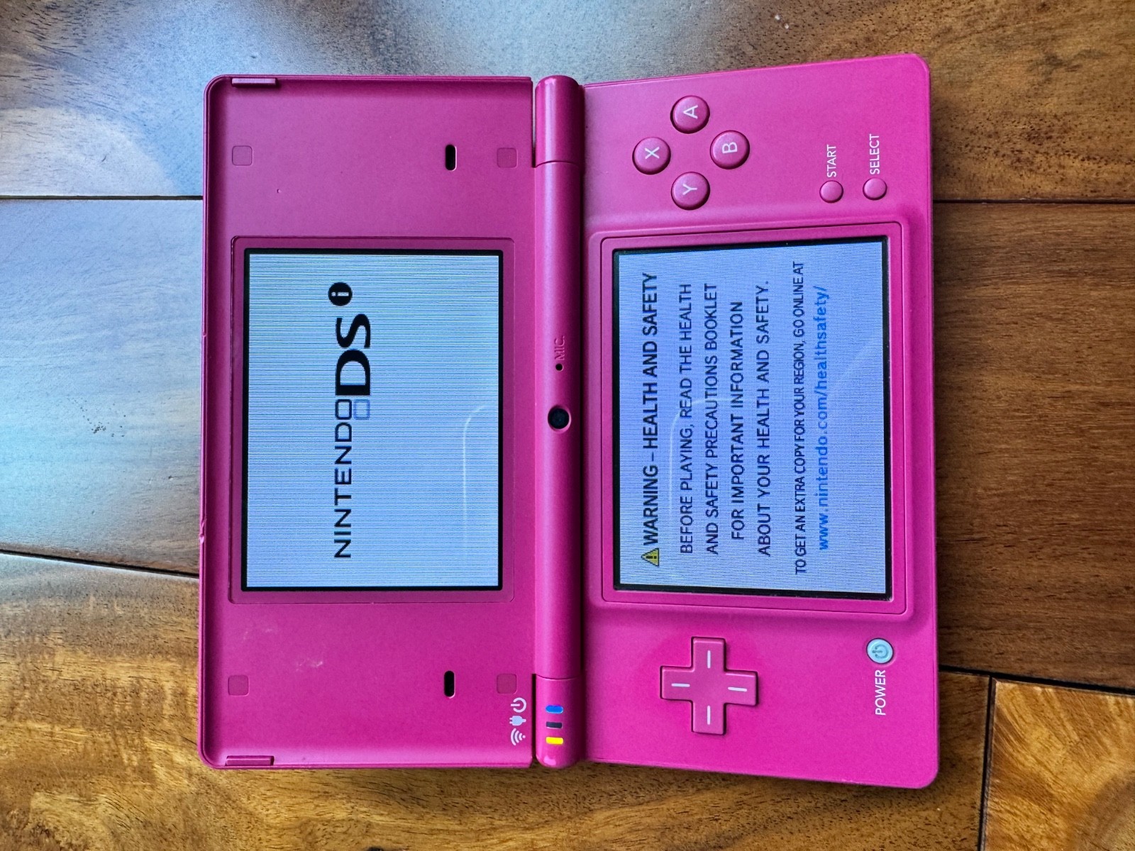 nintendo dsi pink with stylus and charger