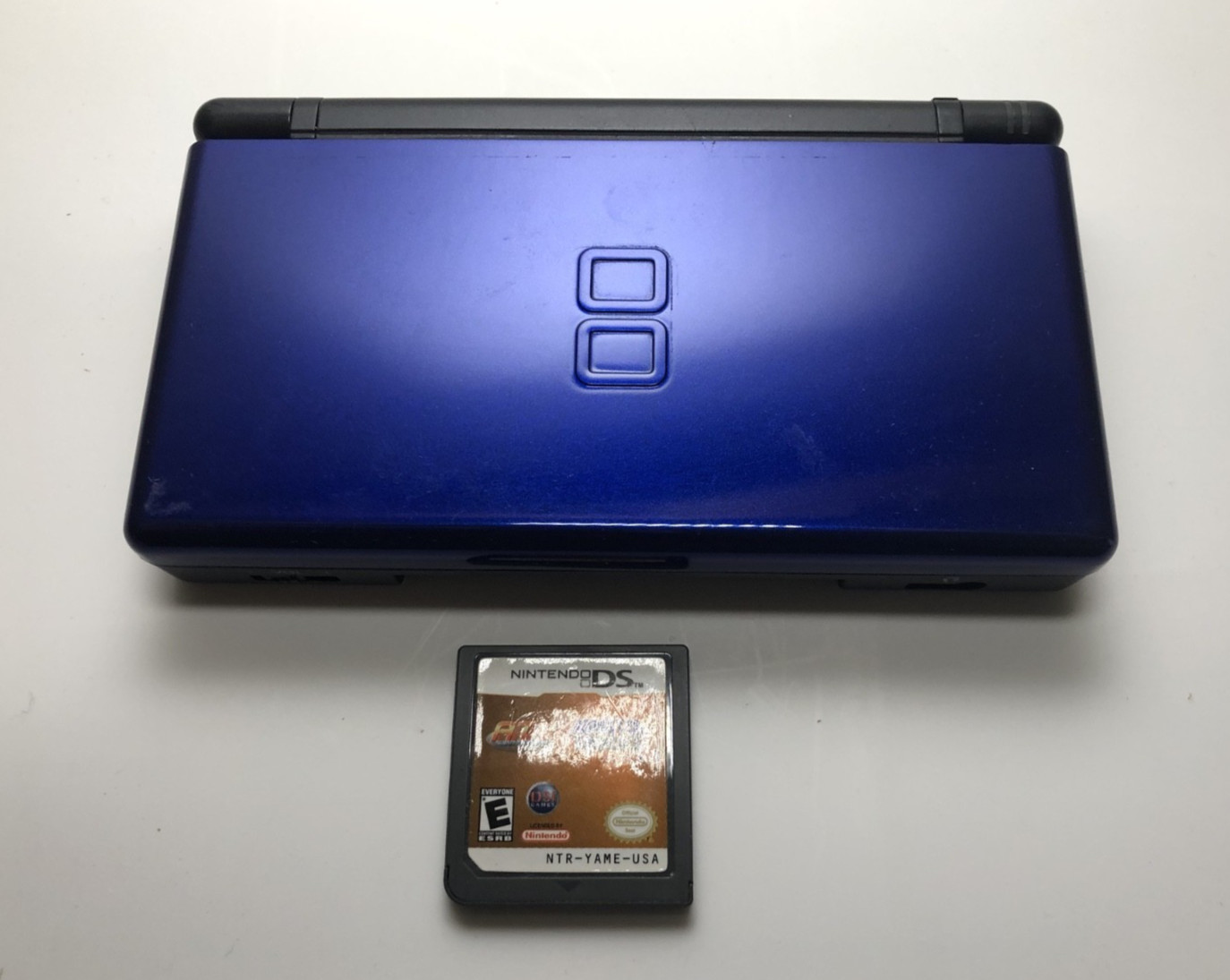 Nintendo DS Lite Blue w/ 1 game – No Charger/Stylus/GBA port Cover – Loose hinge