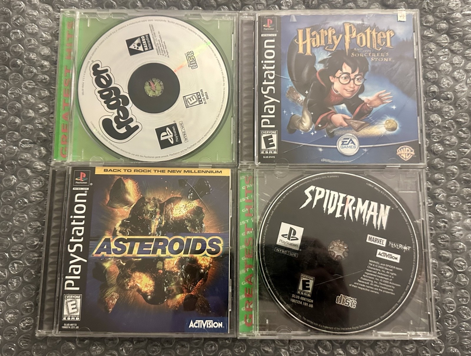 Sony PlayStation 1 Console (Gray), two Compatible Controllers, four PS1 Games