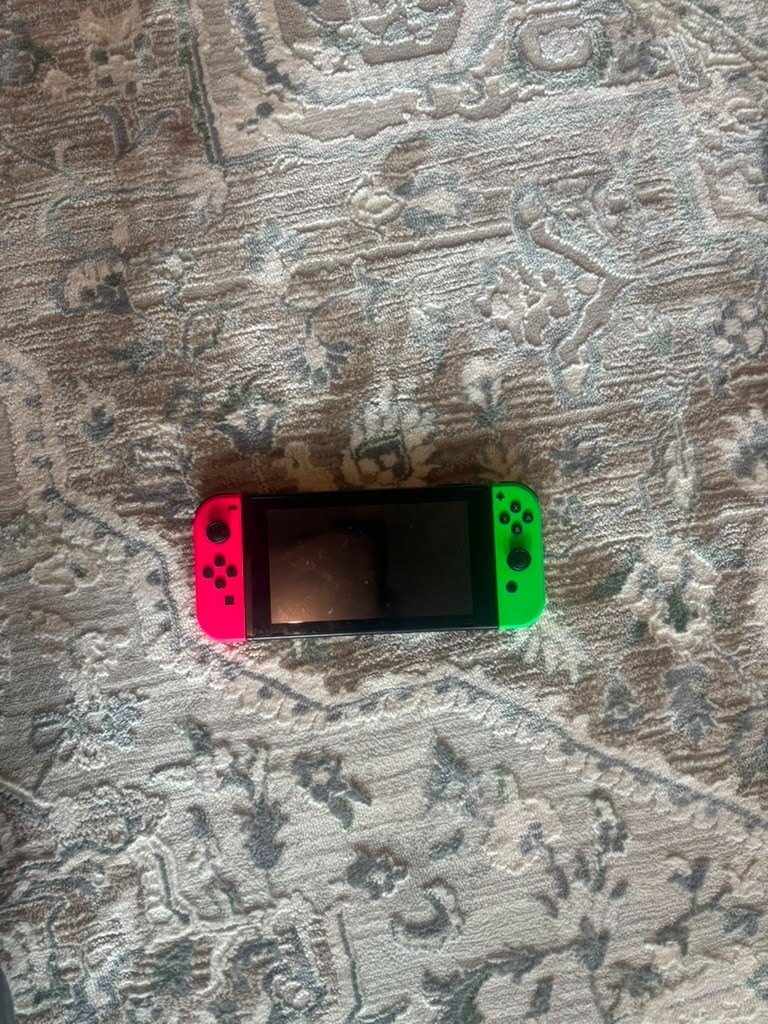 Nintendo Switch Handheld Console – Pink/Green joycons- Used