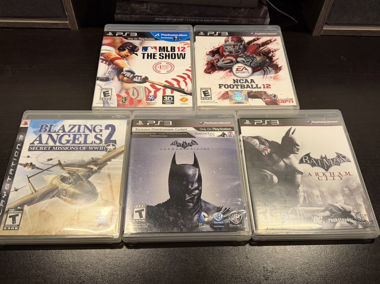Lot of 5 PS3 Games Arkham City and Origins MLB 12 The Show NCAA Football Angels