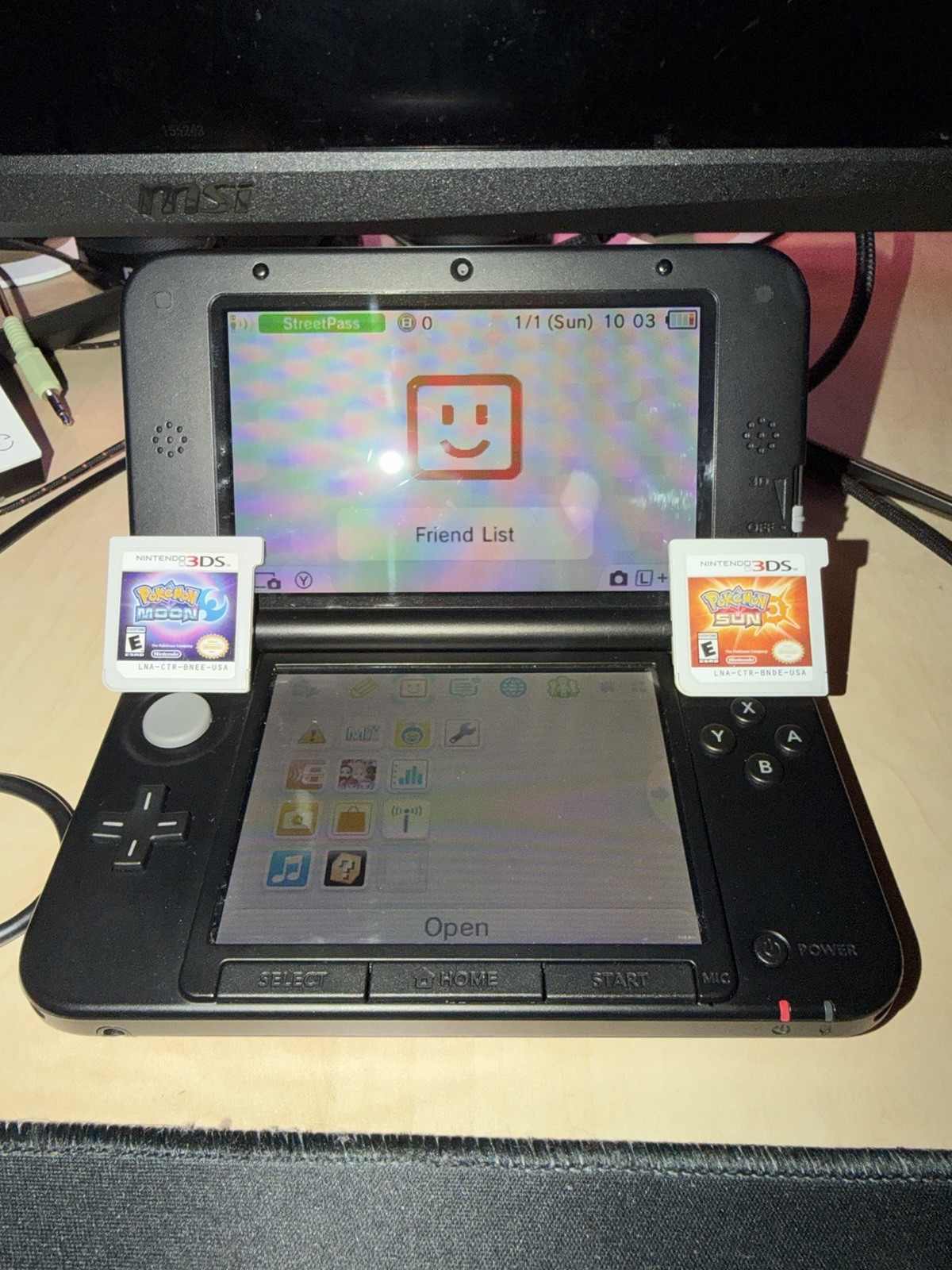 Nintendo 3DS XL RED/BLACK w/ Pokemon Sun & Moon (BUNDLE)