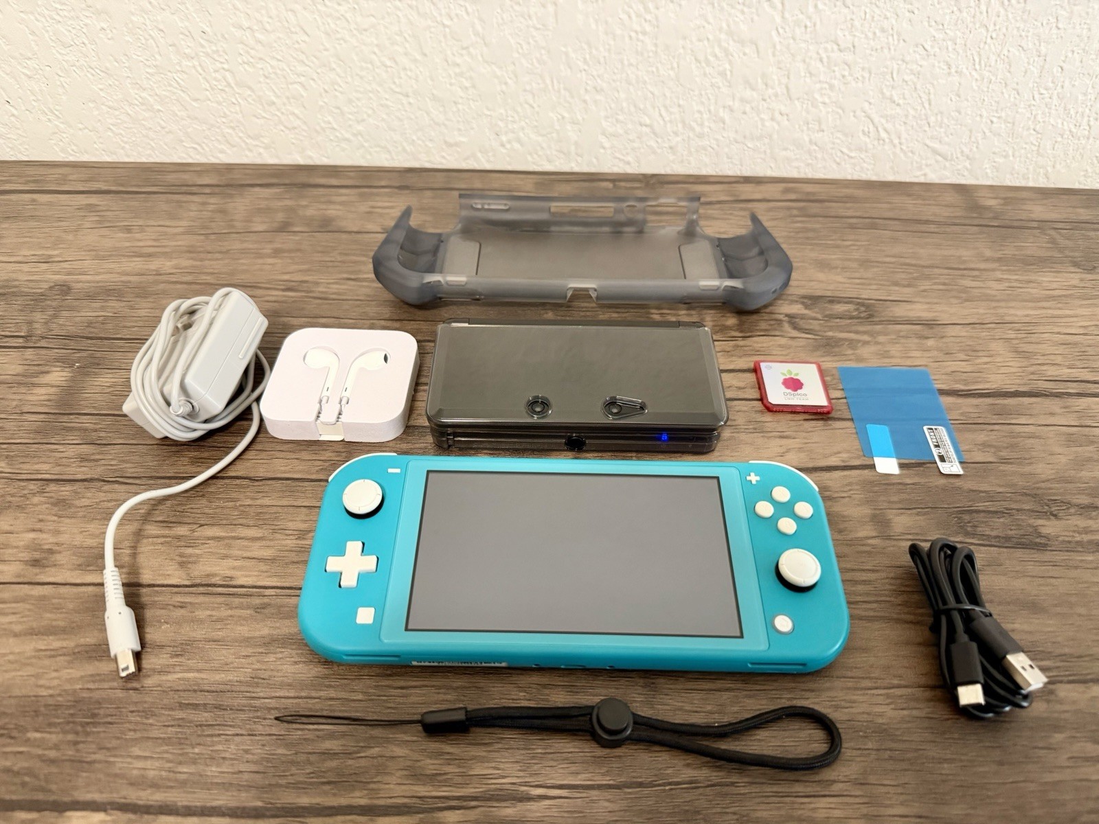 Nintendo 3DS Cosmo Black & Nintendo Switch Lite Teal Blue Bundle (With Bonuses)