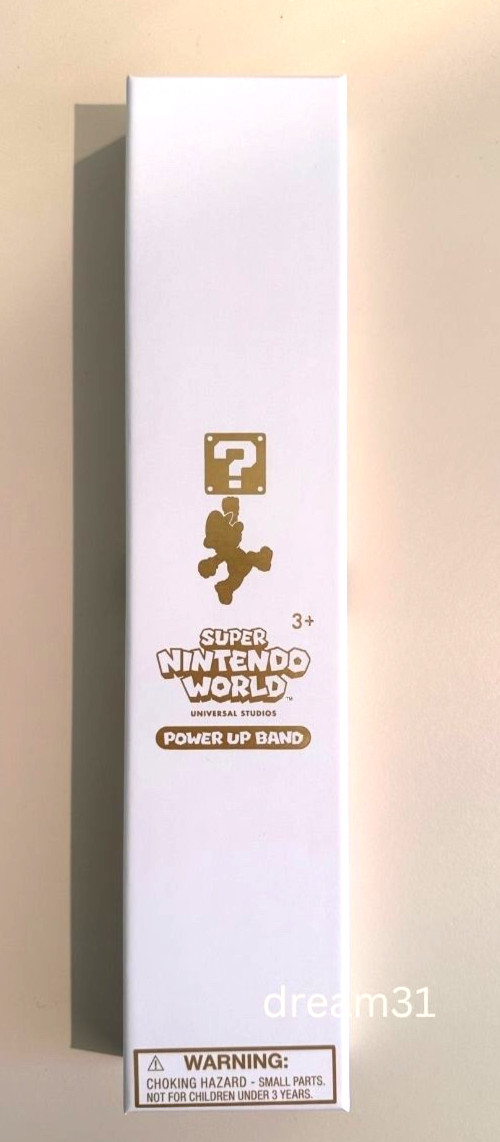 Universal Studios Epic Universe Super Nintendo World Power Up Band – Gold Mario