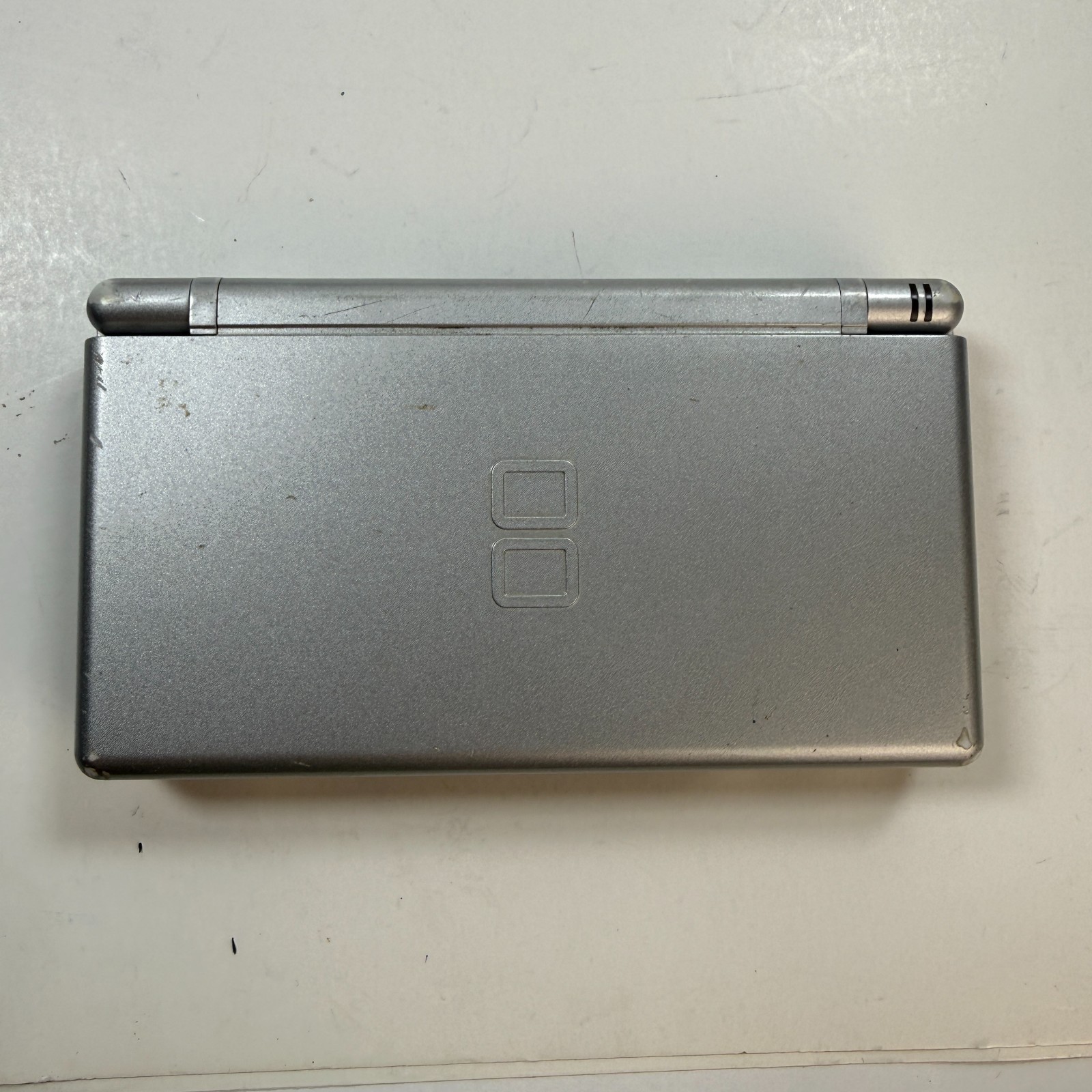 Nintendo DS Lite USG-001 Silver Handheld Console 4 Games + Charger