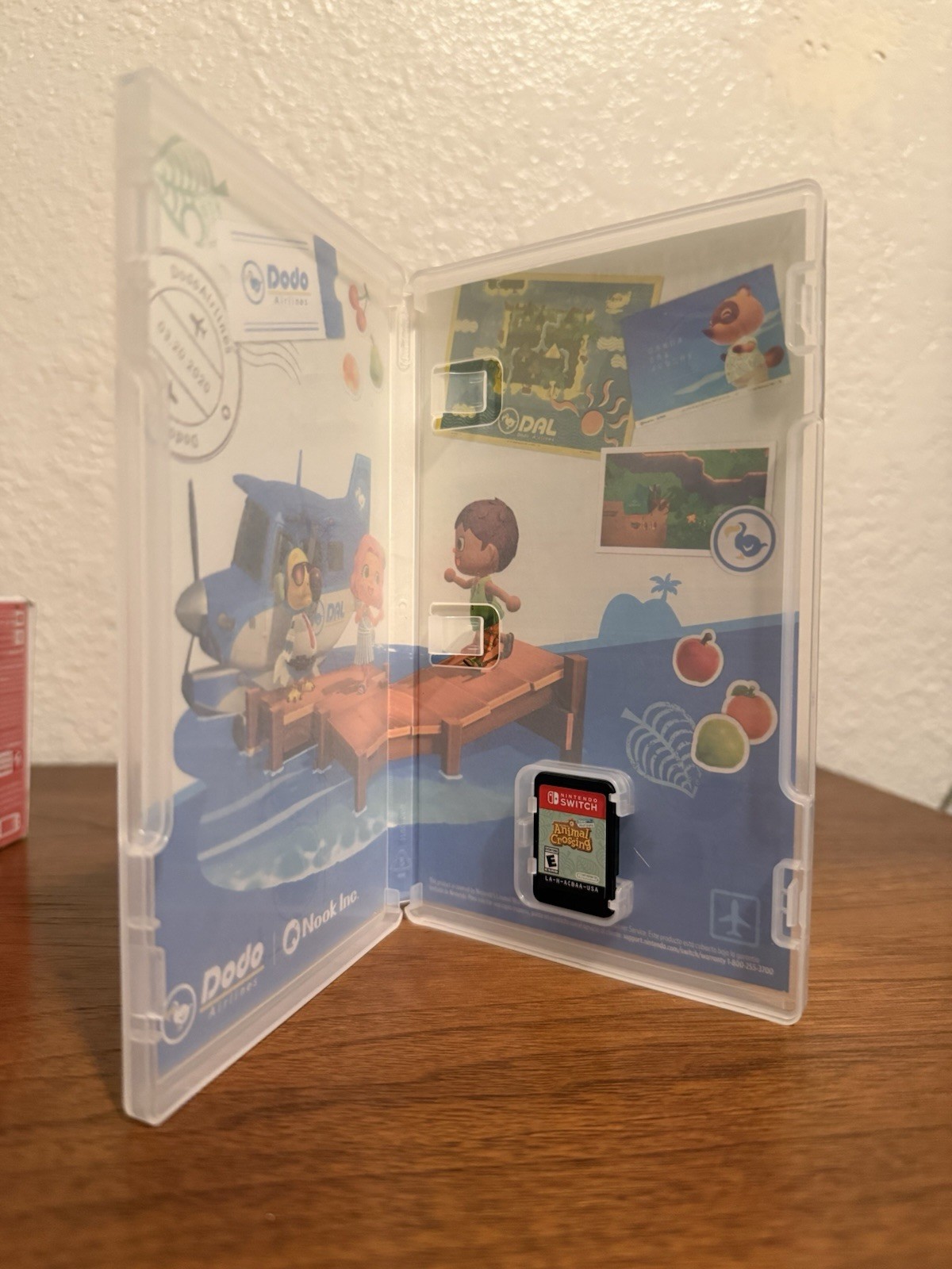 Nintendo Switch Lite 32 GB Gaming Console – Coral + Animal Crossing New Horizons