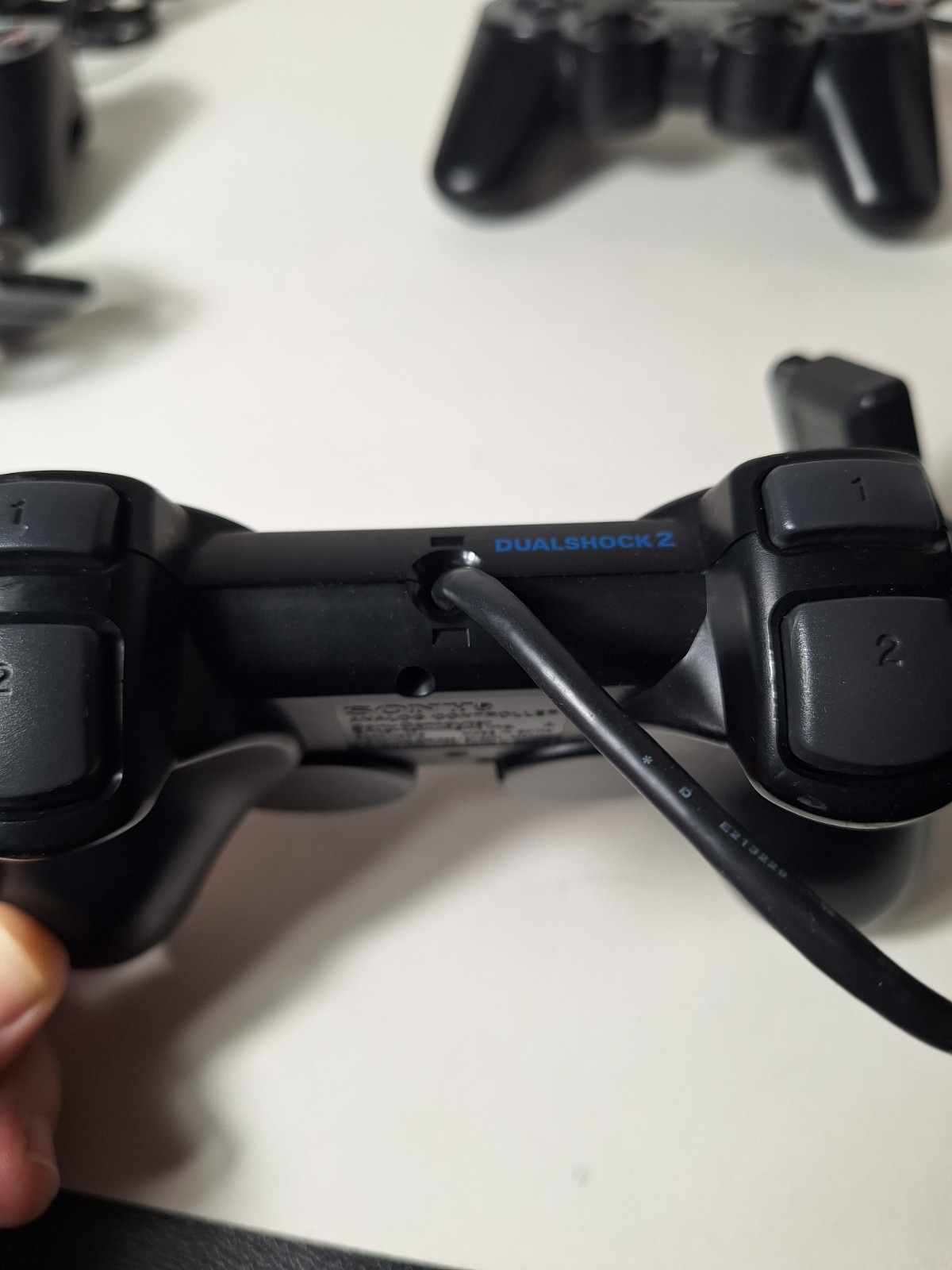 Sony PS1 PS2 Controllers Lot Of 4 Wired Black And Gray UNTESTED Parts Or Repair