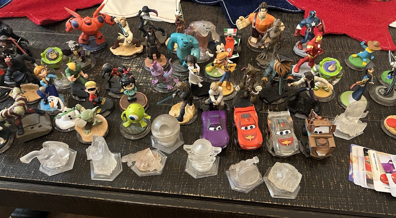 Assortment of Disney Infinity Figures With Power Disks And Play Cards (Not All)