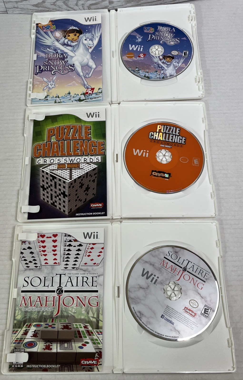 Lot of 8 Nintendo Wii Games Barbie Dora Wii Fit Plus Puzzle Deal or No Deal.