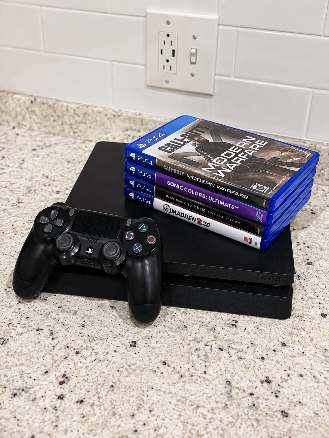 Sony PS4 Slim 4K Black Console w/ DualShock 4 + 4 Games Bundle